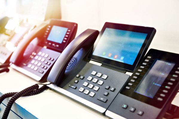 8X8 voip service overview voip phones on desk